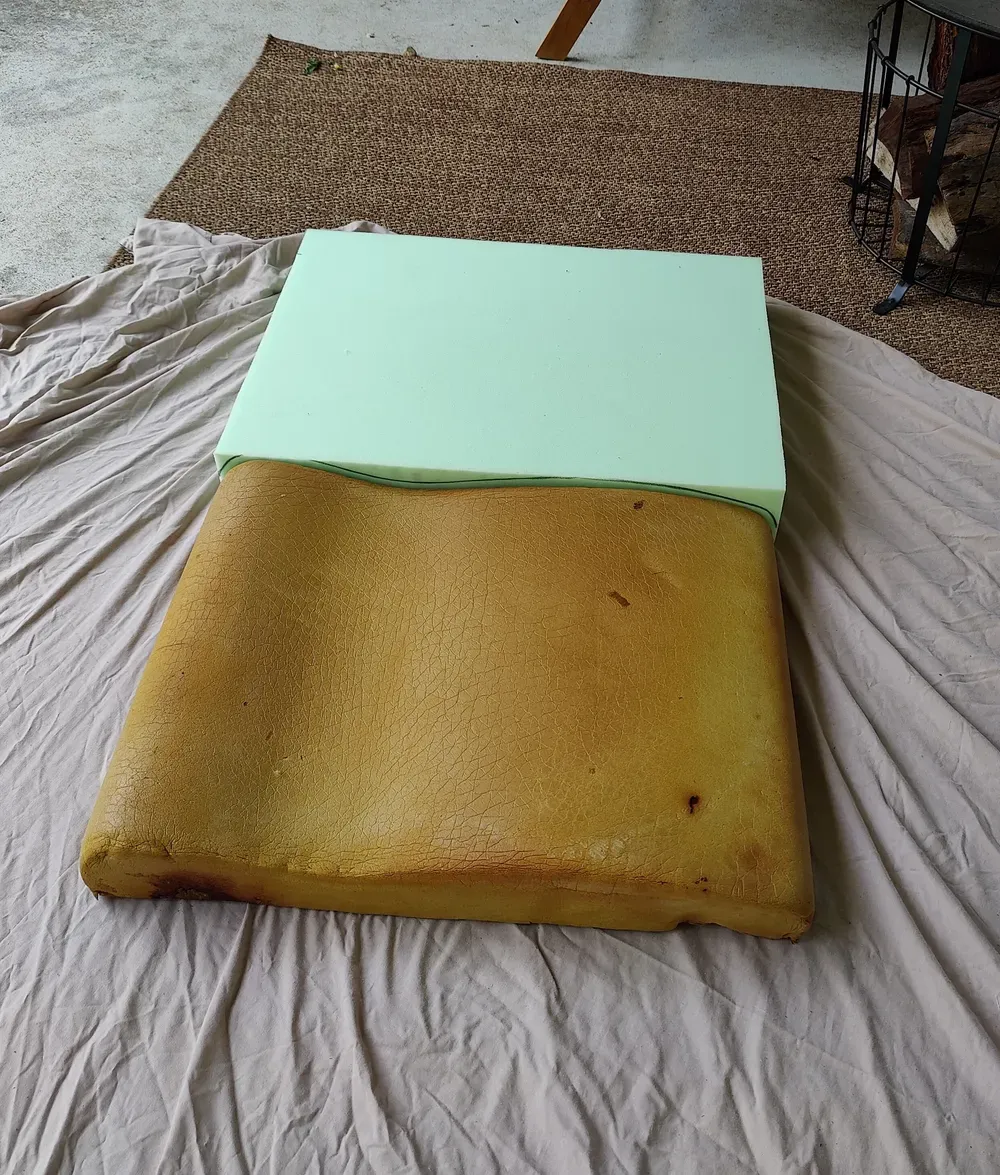 Tracing the profile of the back onto the new foam cushion